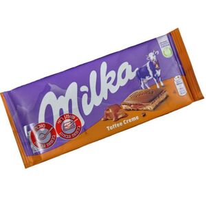 שוקולד חלב מילקה עם קרם טופי 100 גרם